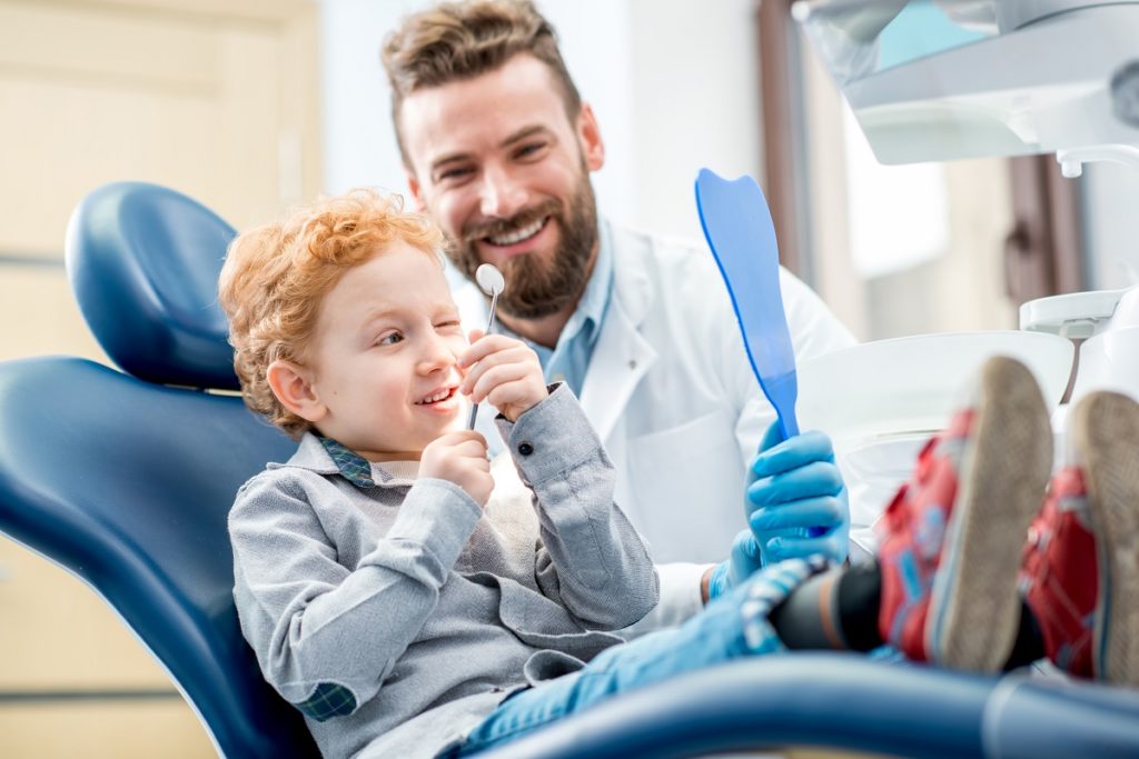 kid in the dental clinic